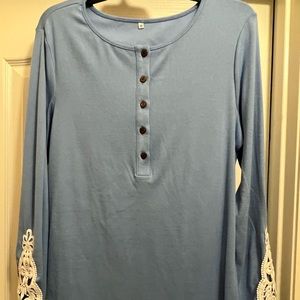 Tunic light blue with lace sleeves women’s size medium long sleeve shirt.
